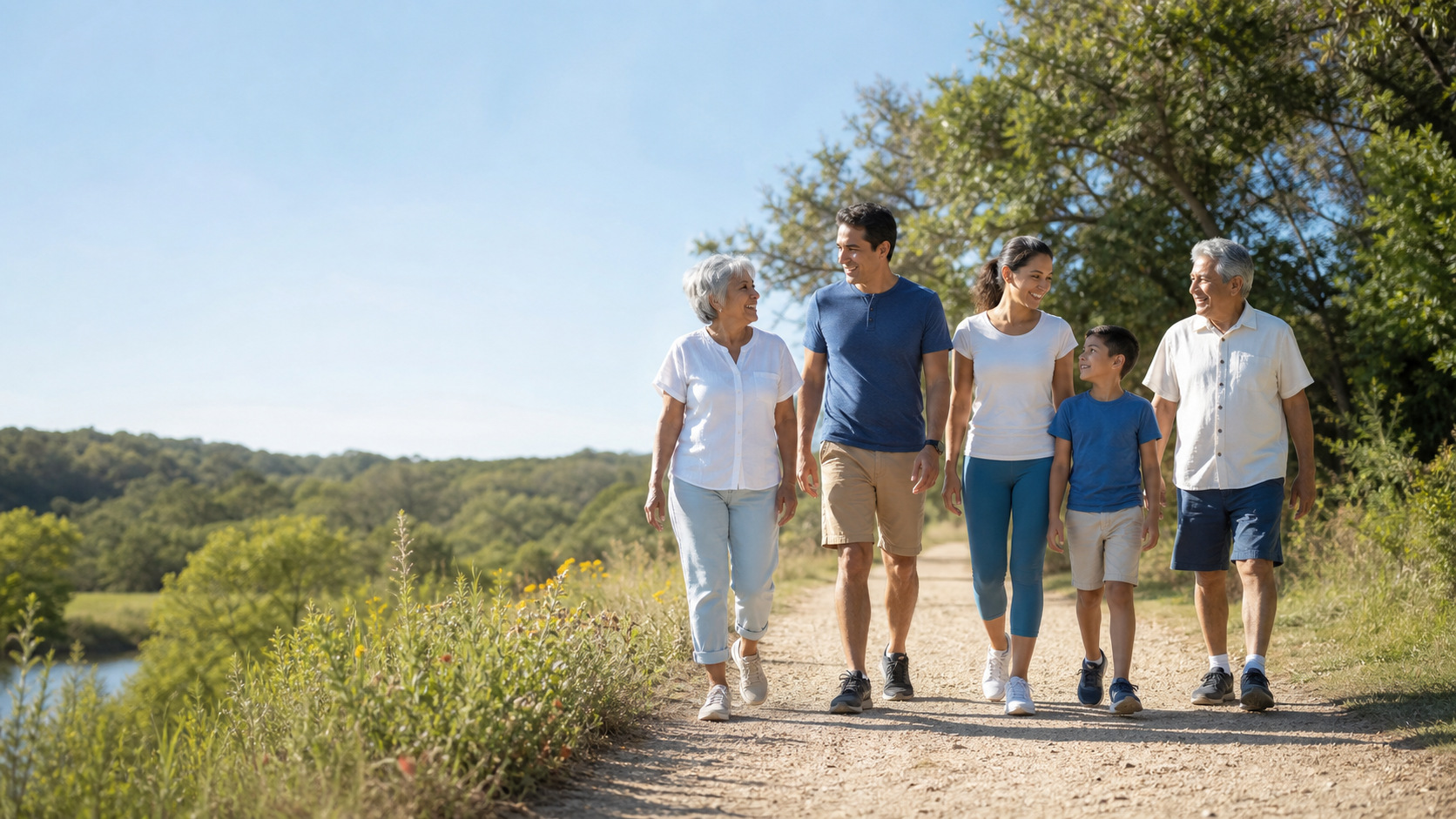 A multigenerational family walking together outdoors in the Texas Hill Country